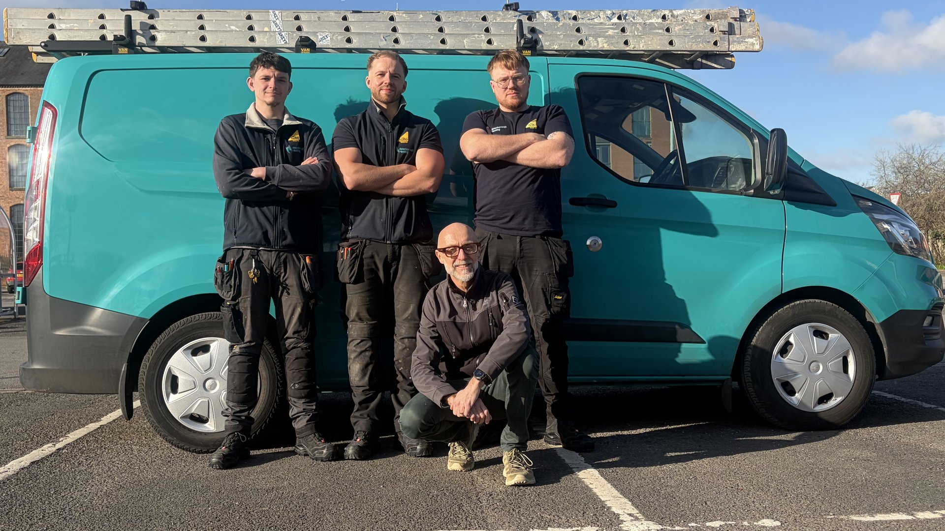 The Attenborough Heating team with their teal van